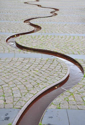 Rill curves thru cobblestone - PAM - meander